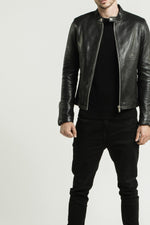 Black lambskin jacket with a semi-matte finish and silver zips. - Image n°13