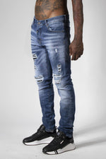 Blue denim jeans with destroyed finish - Image n°10