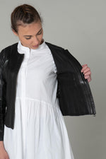 Black lambskin jacket, slim fit, textured ridges, biker-style collar. - Image n°5