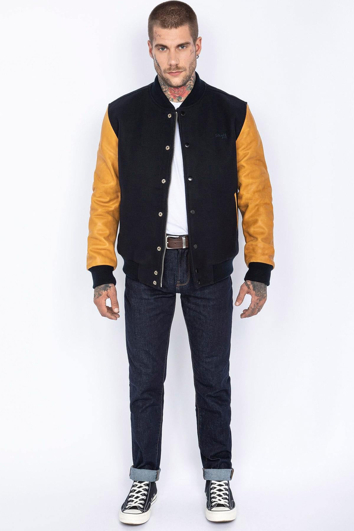 Schott's varsity jacket: navy wool with cognac cowhide sleeves. - Image n°3