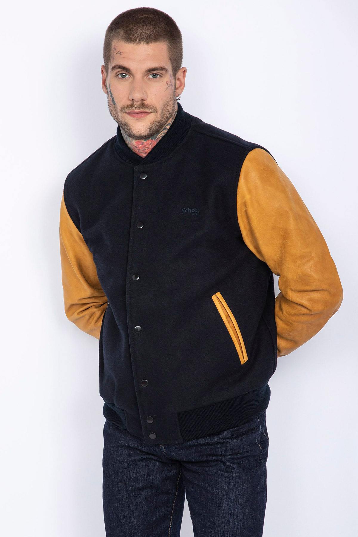 Schott's varsity jacket: navy wool with cognac cowhide sleeves. - Image n°4