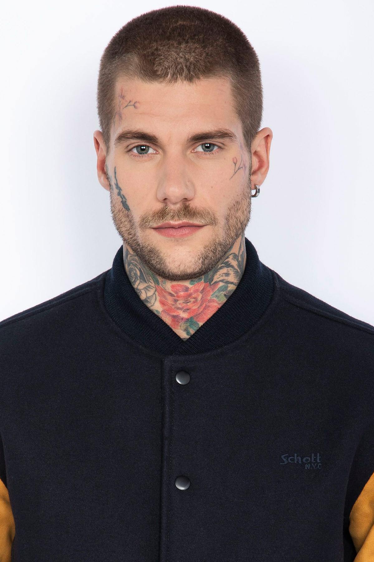 Schott's varsity jacket: navy wool with cognac cowhide sleeves. - Image n°5