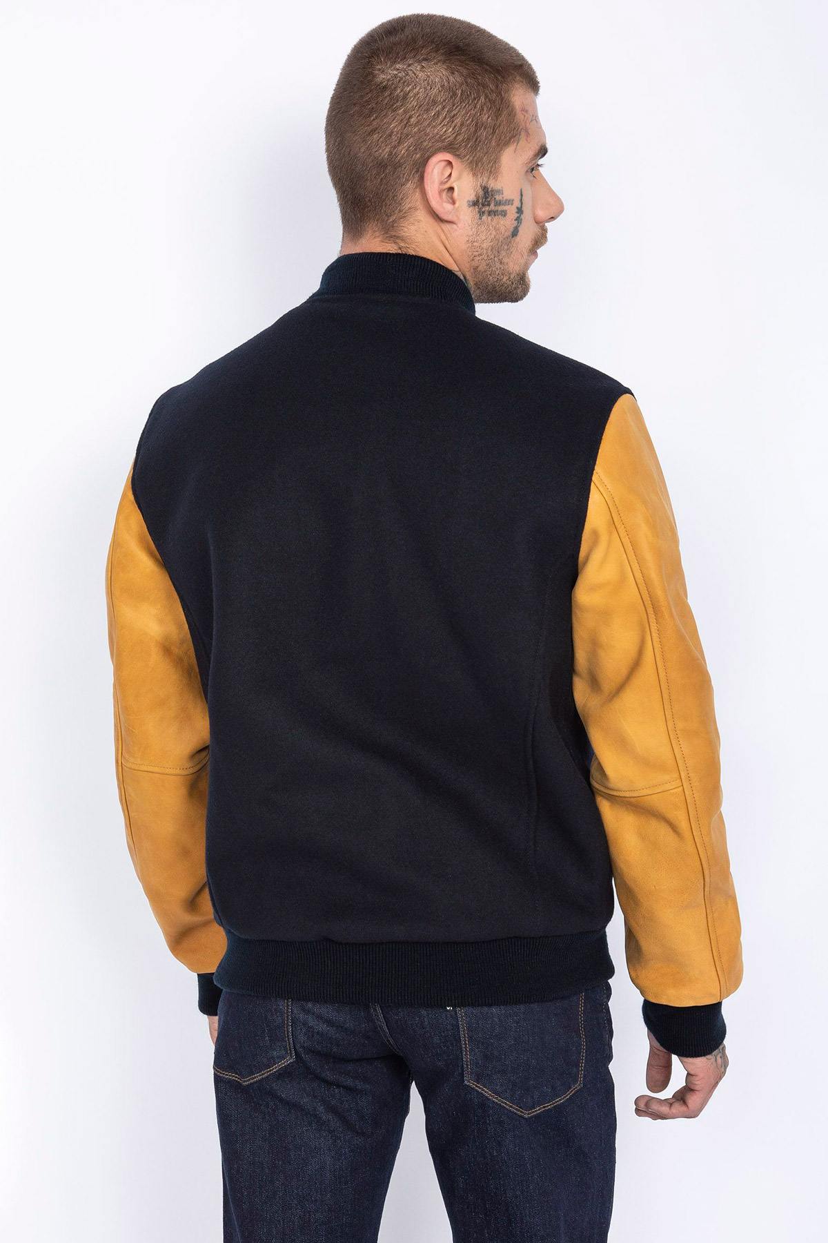 Schott's varsity jacket: navy wool with cognac cowhide sleeves. - Image n°2