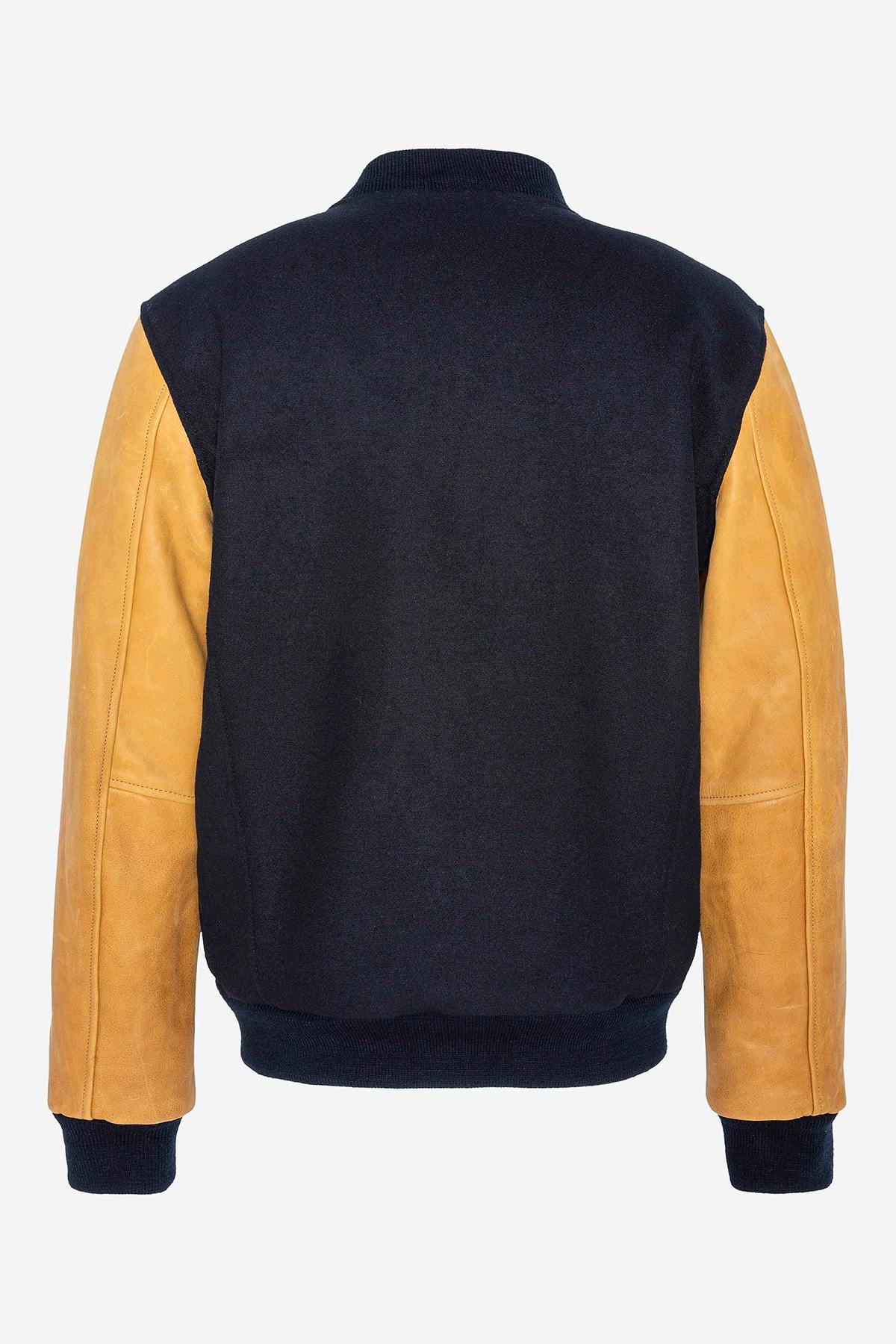 Schott's varsity jacket: navy wool with cognac cowhide sleeves. - Image n°7