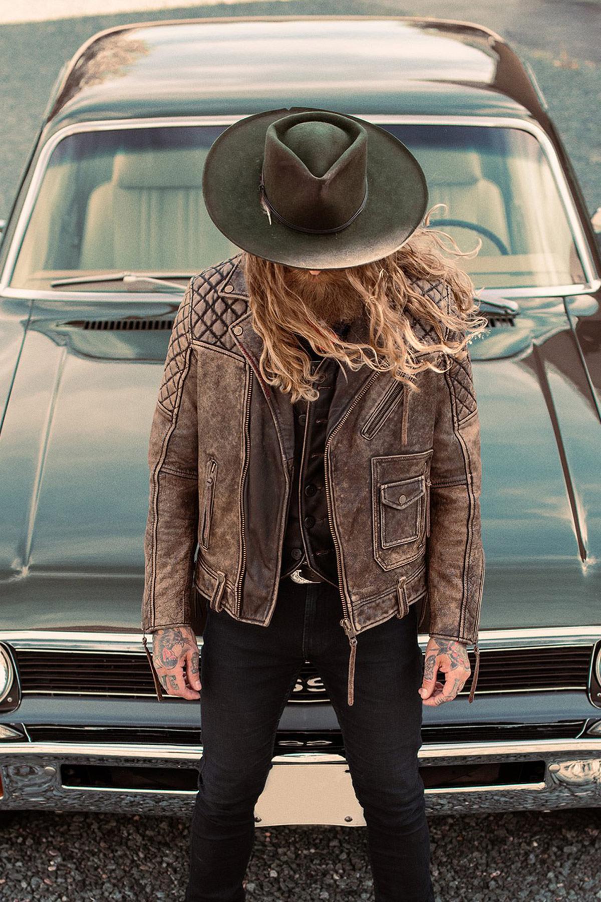 Buffalo leather perfecto with rugged vintage finish. Zips and lacing. - Image n°1