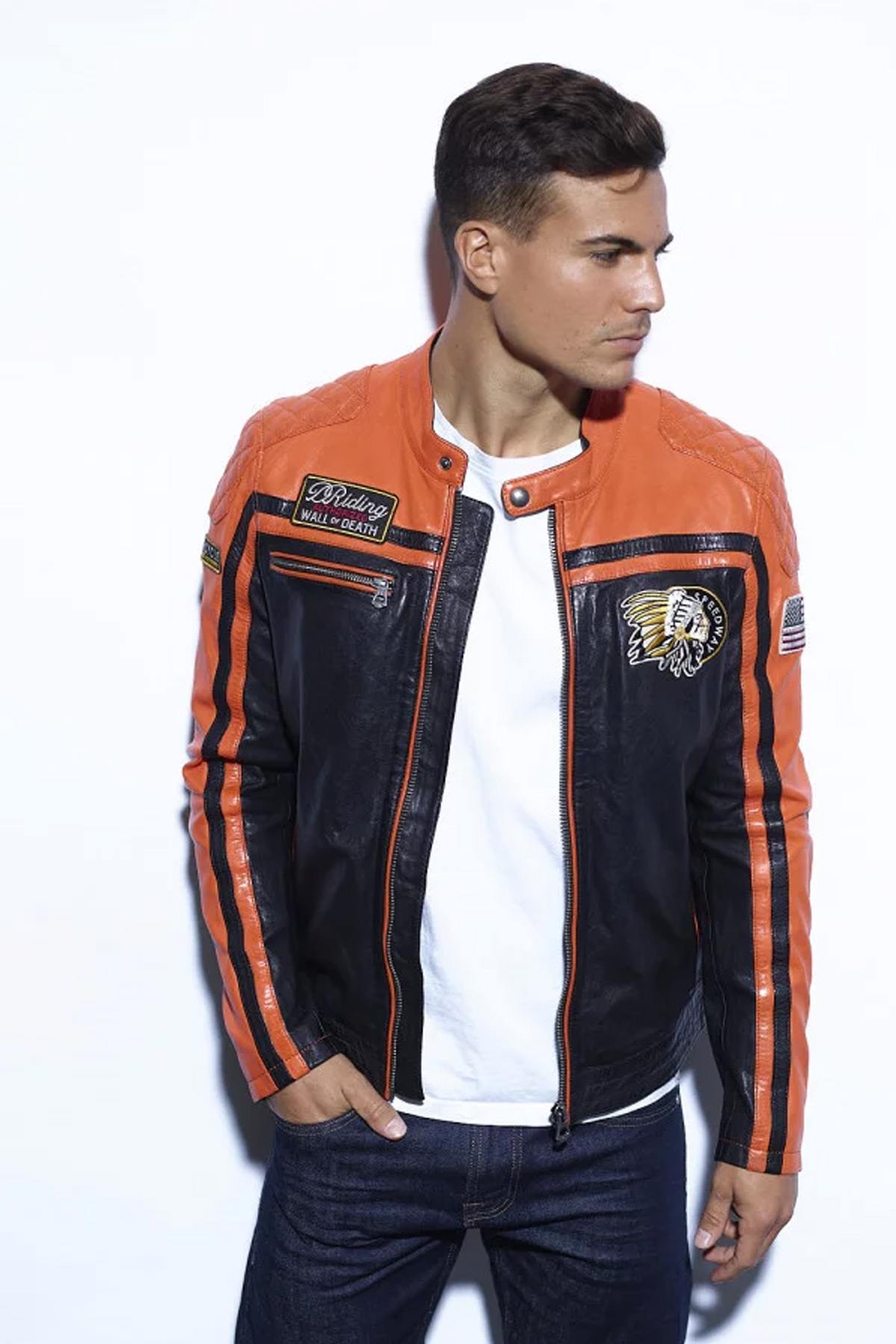 Bold lambskin jacket: black and orange, matelasséd, vintage patches. - Image n°1