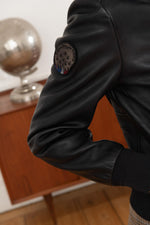 Aviator-style navy lambskin jacket with removable shearling collar. - Image n°7