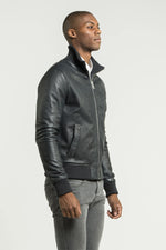 Blue leather jacket with ribbed edges - Image n°4