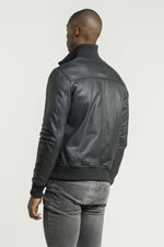 Blue leather jacket with ribbed edges - Image n°3