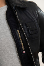 French aviator-inspired navy sheepskin jacket with a patinated finish. - Image n°8