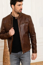 Oiled dark cognac lambskin in a vintage biker cut. Slim, quilted shoulders. - Image n°8