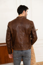 Oiled dark cognac lambskin in a vintage biker cut. Slim, quilted shoulders. - Image n°5