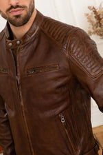 Oiled dark cognac lambskin in a vintage biker cut. Slim, quilted shoulders. - Image n°2