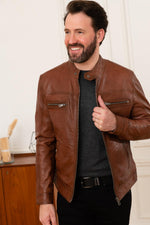 A rich cognac shearling jacket with a marbled, supple finish - Image n°1