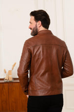 A rich cognac shearling jacket with a marbled, supple finish - Image n°6