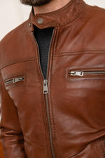 A rich cognac shearling jacket with a marbled, supple finish - Image n°9