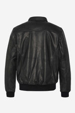 Schott NYC's black goat leather A-2 jacket: a timeless aviator icon. - Image n°6
