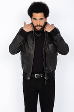 Schott NYC's black goat leather A-2 jacket: a timeless aviator icon. - Image n°3