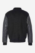 Schott's iconic black varsity jacket blends wool and cowhide leather. - Image n°6