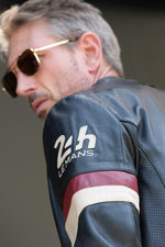 Black sheepskin jacket with racing heritage and luxury finishes. - Image n°2