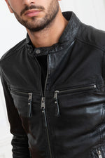 A black sheepskin jacket with a slim, modern cut for effortless style. - Image n°11