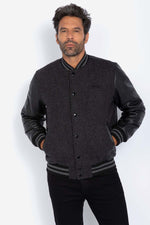 Iconic Schott varsity jacket in grey wool and black calfskin sleeves. - Image n°1