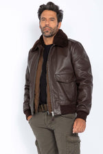 Brown cowhide aviator jacket by Schott. Detachable shearling collar. - Image n°1