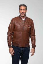 Steve McQueen's maroon lambskin jacket: racing patches, vintage fit. - Image n°1
