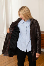 Rich brown lambskin jacket, cinched at the waist for a sleek look. - Image n°6