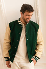 Schott's varsity jacket in green wool and beige vachetta leather. - Image n°1