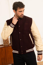 Schott NYC's varsity jacket: bordeaux leather sleeves meet beige wool. - Image n°1