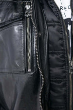 Black lambskin jacket with vintage moto details, sleek and road-ready. - Image n°7