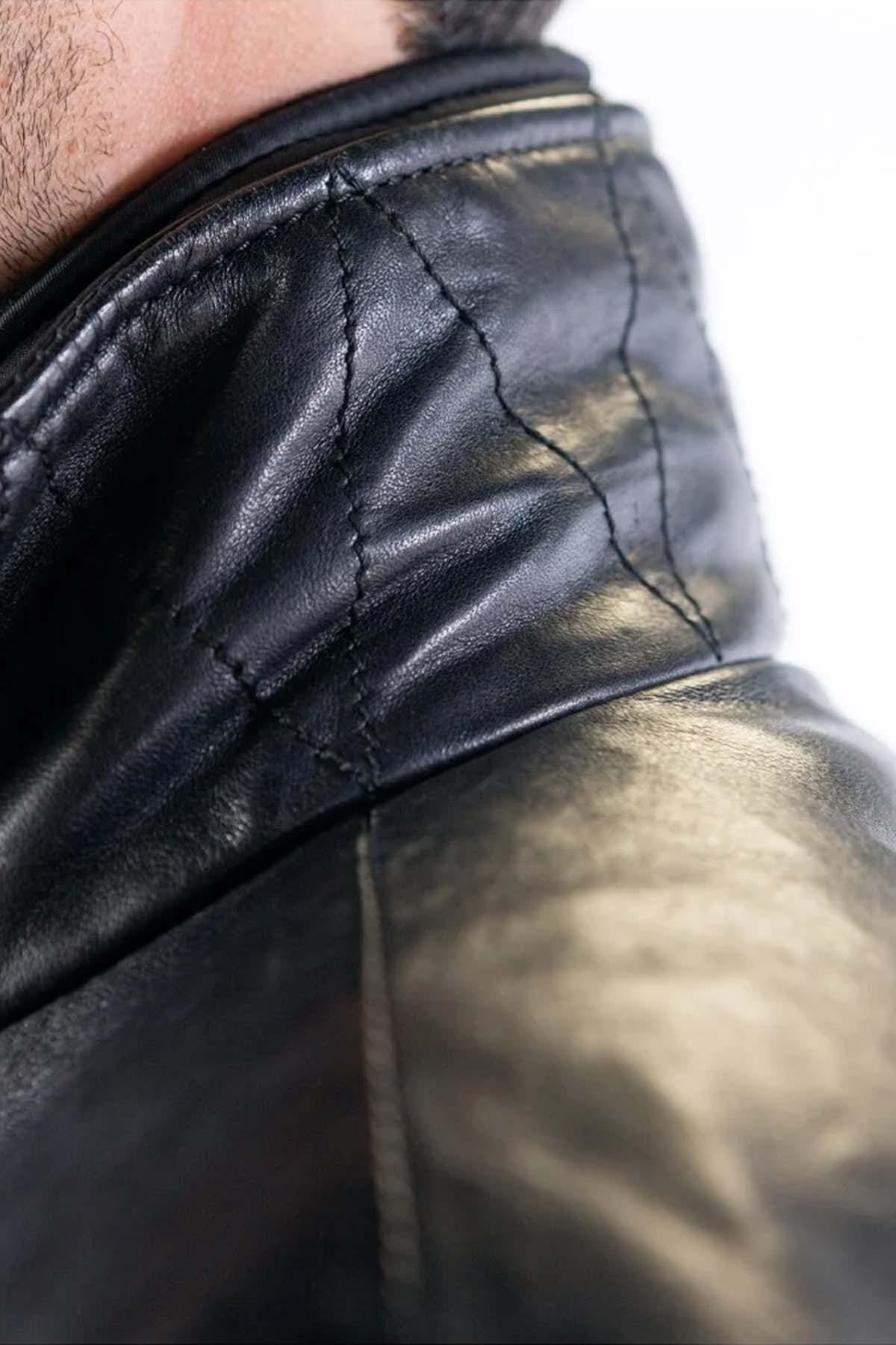 Black lambskin jacket with vintage moto details, sleek and road-ready. - Image n°8