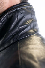Black lambskin jacket with vintage moto details, sleek and road-ready. - Image n°8