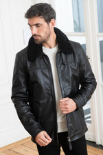 Schott NYC's black cowhide jacket, mid-thigh aviator fit. - Image n°1
