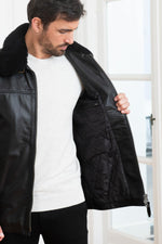 Schott NYC's black cowhide jacket, mid-thigh aviator fit. - Image n°4