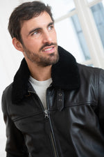 Schott NYC's black cowhide jacket, mid-thigh aviator fit. - Image n°6