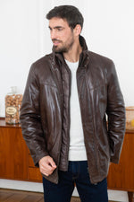 Timeless brown lambskin jacket with biker flair and removable warmth. - Image n°1