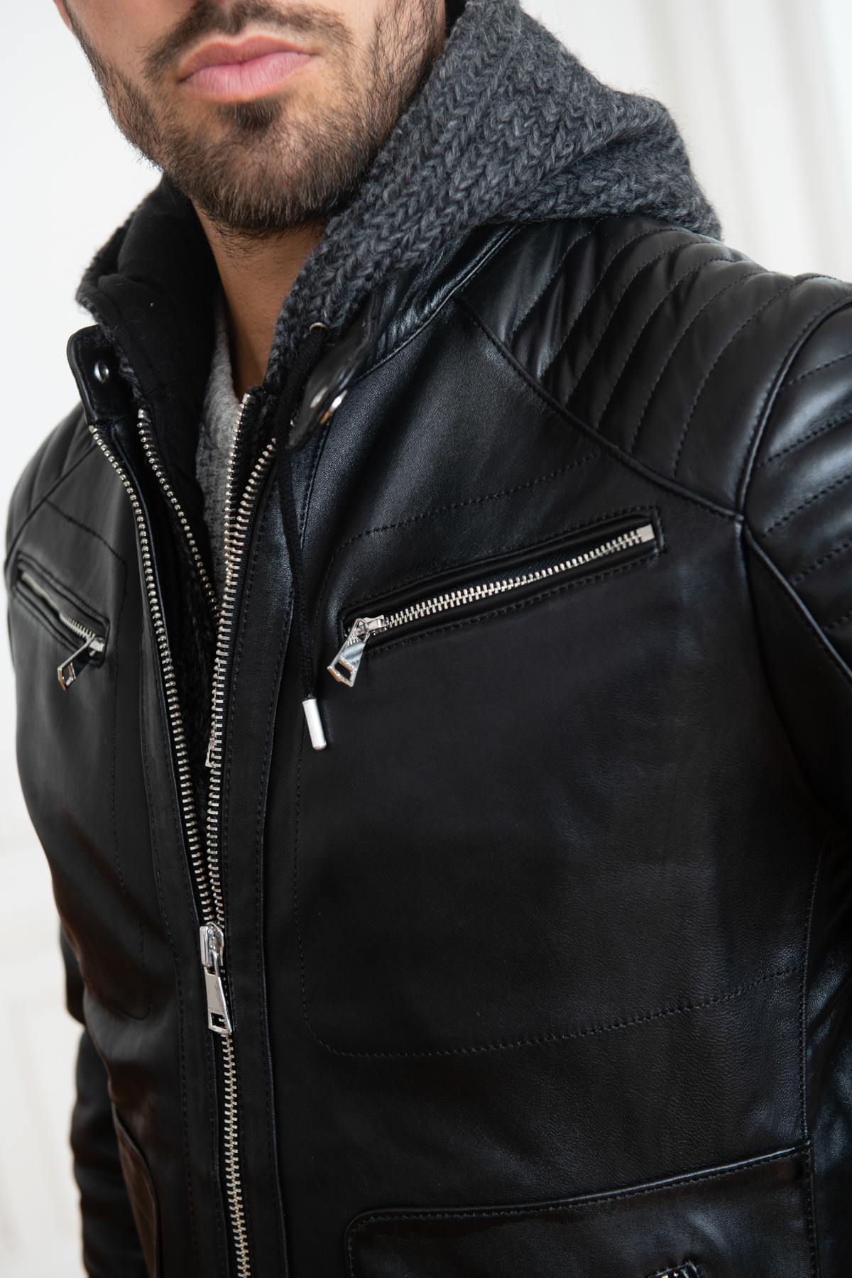 Slim black lambskin jacket with a zip-off wool hood for urban edge. - Image n°8