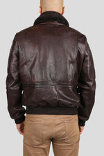 Brown cowhide aviator jacket with vintage patches and epaulettes. - Image n°3
