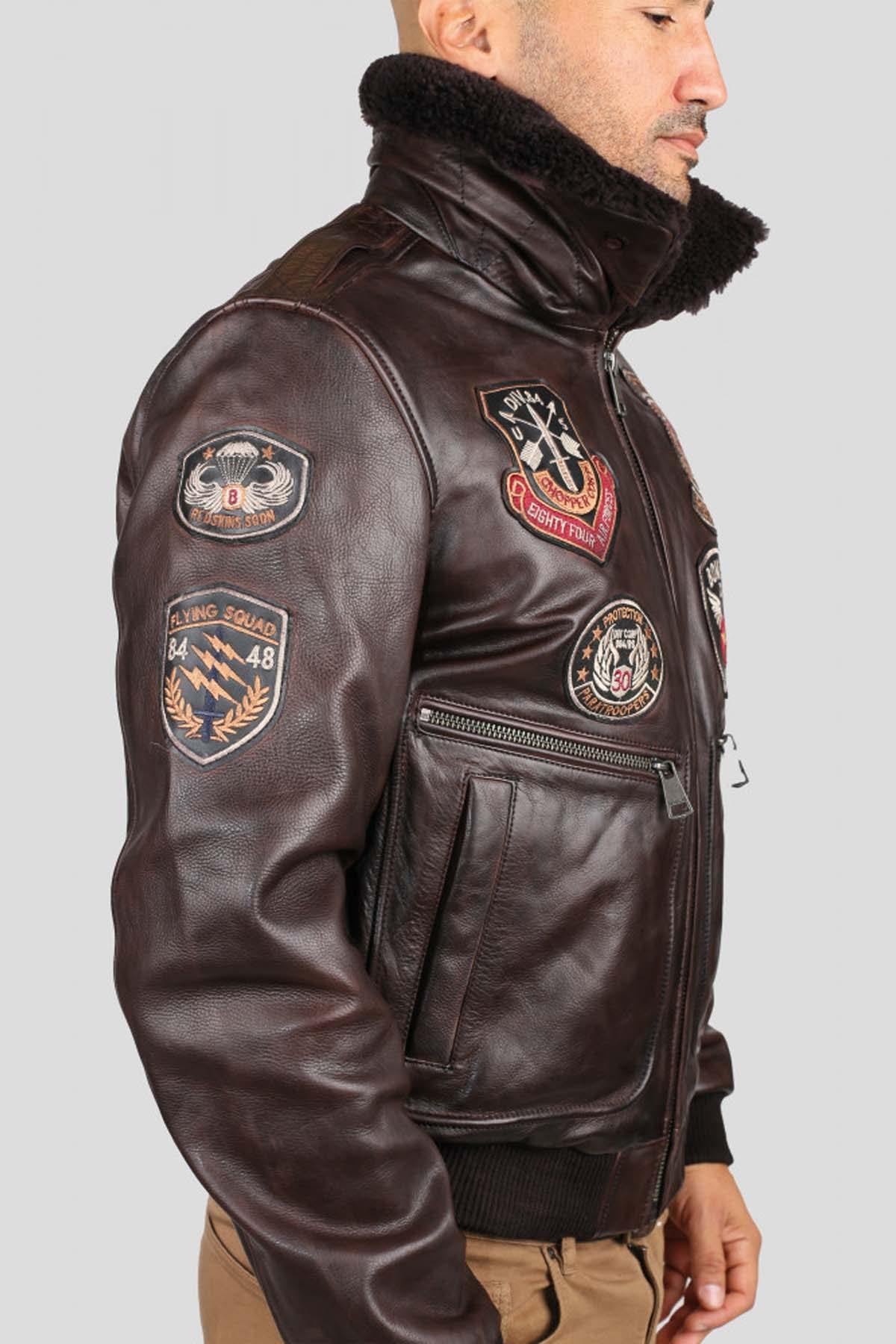 Brown cowhide aviator jacket with vintage patches and epaulettes. - Image n°2
