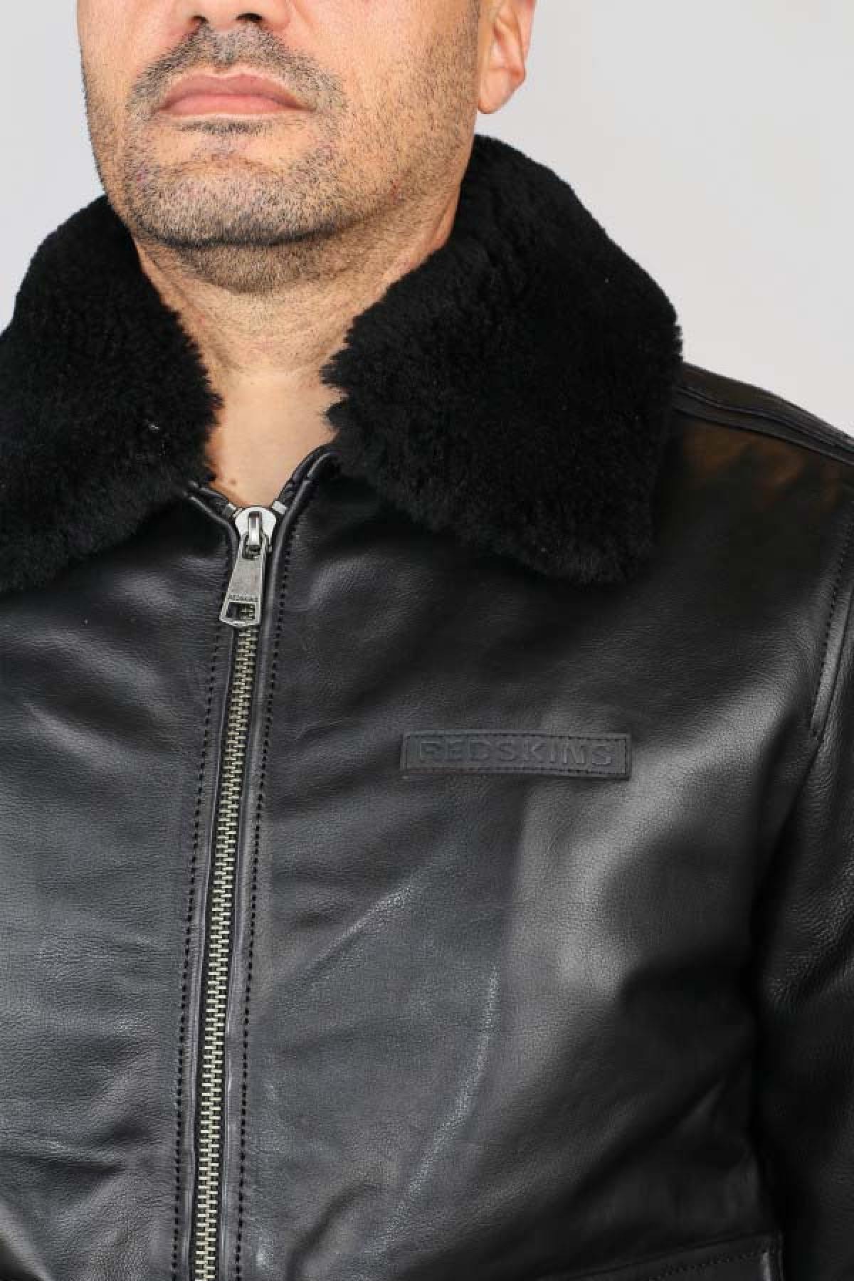 Sleek black cowhide aviator jacket with fur collar and zip closure. - Image n°4