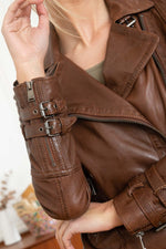 Mid-brown sheepskin biker jacket with vintage patina and adjustable straps. - Image n°10