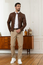 Mid-brown leather jacket with a motard collar and a snug, aged fit. - Image n°7