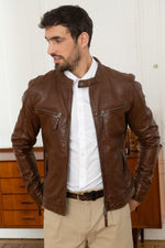 Mid-brown leather jacket with a motard collar and a snug, aged fit. - Image n°6