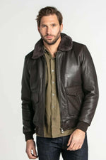 Brown air-milled cowhide aviator jacket with detachable fur collar. - Image n°1