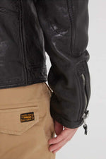 A black lambskin jacket with retro racing details - Image n°9