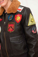 Top Gun maroon goatskin jacket: 17 patches, removable faux-fur collar. - Image n°9