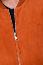 Supple lambskin teddy jacket in bold African orange for all seasons. - Image n°6