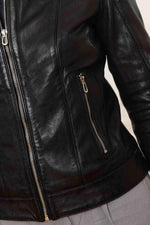 Sleek black lambskin biker jacket, effortless motard elegance. - Image n°2